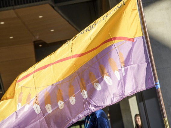The flag of the Tohono O’odham Nation at the Health Sciences Innovation Building blessing