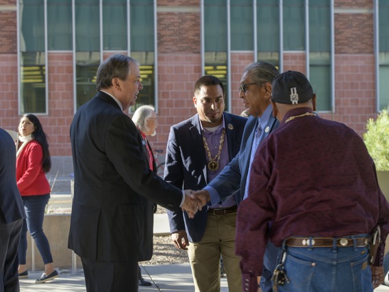 After the blessing, Senior Vice President for the University of Arizona Health Sciences Michael D. Dake, MD, shakes the hand of Ned Norris, chairman of the Tohono O’odham Nation. 