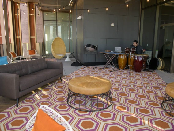 A porch on the upper floors of Health Sciences Innovation Building provides a unique event space. Outdoor furniture is available for the Health Sciences community to enjoy.