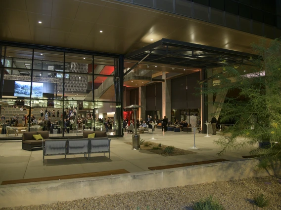 Three large garage doors create an indoor/outdoor environment and extend the space of the Forum.