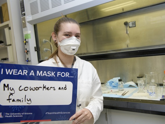 Angela Smith is an undergraduate research fellow studying pain in Todd Vanderah’s lab at the College of Medicine – Tucson. Smith wears a mask for her coworkers and family.