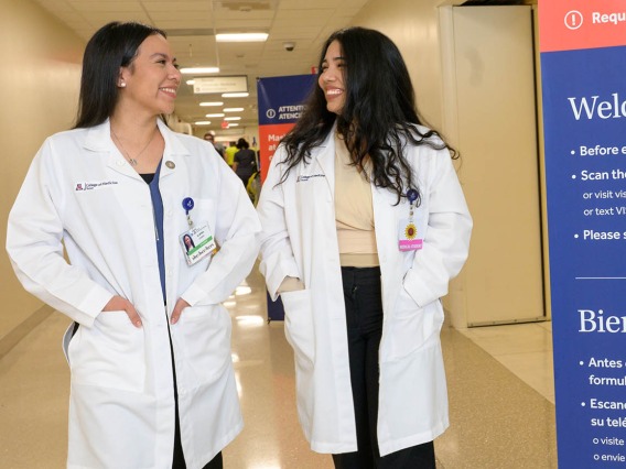 (From left) Aspiring physicians Iliana Cosio and Isabellyana  Dominguez met as undergraduate students in FACES Conversantes, and their friendship continues in medical school.