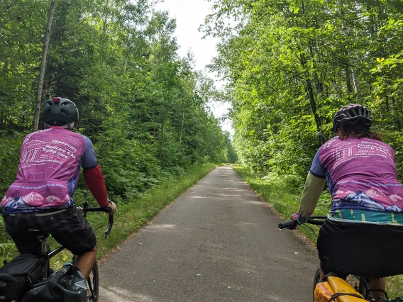 The riders wore jerseys printed with word clouds about health care as a way to prompt conversations with people they met along the bike route.