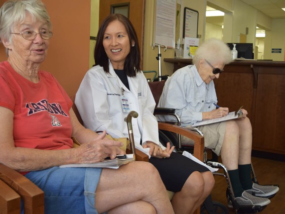Research led by Dr. Jeannie Lee (center) showed that adults with diabetes or hypertension benefit from physicians, nurses, pharmacists and other health care professionals working together with patients and families. (Photo: University of Arizona Health Sciences/David Mogollon)