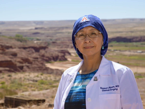 Vanessa Jensen, MD, graduated from the University of Arizona College of Medicine – Tucson in 2003, and completed her general surgery residency in 2009. She stands on her Navajo homestead overlooking the Kerley-Moenkopi Valley, where many of her family members live.