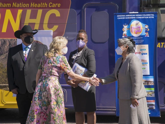 First lady Jill Biden, EdD, greets Francine Gachupin, PhD, MPH, assistant professor at the UArizona College of Medicine – Tucson and member of the UArizona Cancer Center Cancer Prevention and Control Program. Dr. Gachupin, who is a tribal member of the Pueblo of Jemez in New Mexico, is the lead for the Native American Cancer Prevention Grant at the Cancer Center.