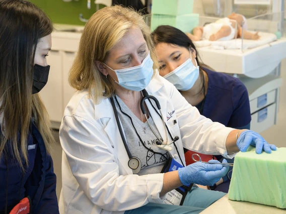 UArizona College of Nursing professor demonstrates suturing techniques for Doctor of Nursing Practice in nurse-midwifery students. 