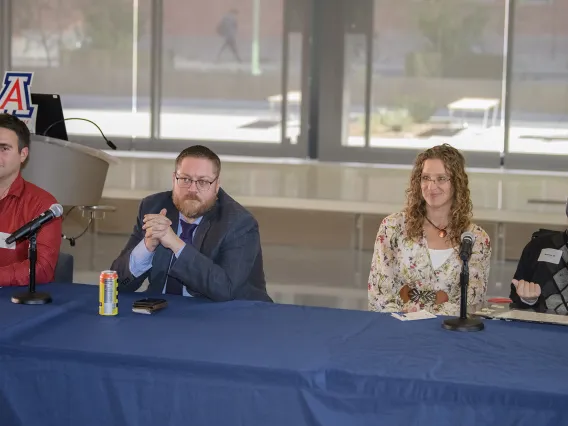 Panelists, from left: Curby Sickmon, Matthew Randle, and interpreter Kelly Hurlbut with Matthew Wangeman.