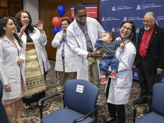 Primary Care Physician scholarship recipients celebrate the announcement of their scholarships.