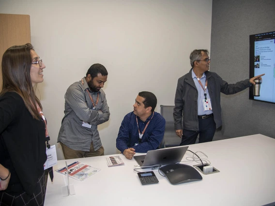 Attendees check out the new space during the grand opening of the Faculty Commons + Advisory, a gathering place where faculty can connect with one another and with experts from various areas of campus to receive advice, direction, and inspiration for research and innovation.