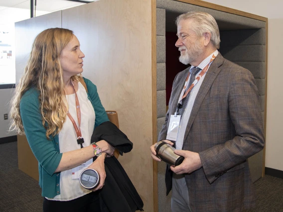 Daniel Derkson, MD, director of the Arizona Center for Rural Health, speaks to faculty member at FC+A grand opening event.