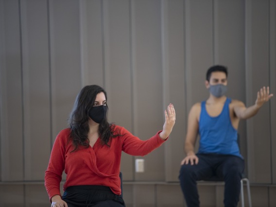 Jennie Greb, left, and Alex Murillo practice mindful movements during the Feldenkrais Method class inside the Forum in the Health Sciences Innovation Building. 
