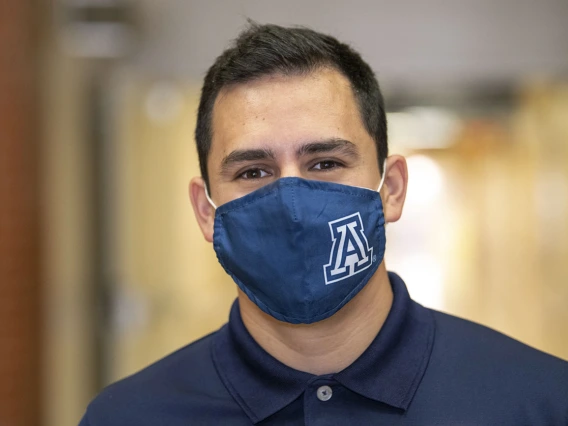 First-year College of Medicine – Tucson student Andres F. Diaz wears a mask for the immunocompromised, especially kids.