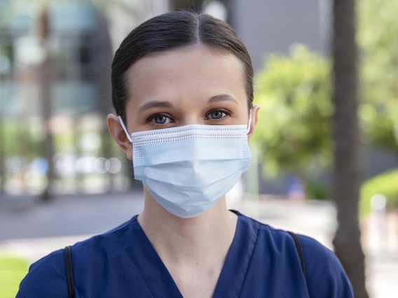 College of Nursing student BrookeLyn Black wears a mask for her patients in Tucson.