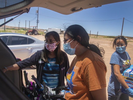 Vanessa Jensen, MD, a University of Arizona College of Medicine – Tucson surgery alumna, helps drop off masks, hand sanitizer and other COVID-19 supplies needed on the Navajo Nation. 