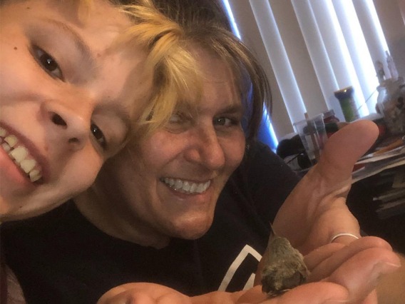 Tammie Anderson and her grandson find a hummingbird while she’s on the clock as an administrative associate for the College of Medicine – Tucson for the Department of Medical Imaging.