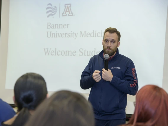 Nicholas Blackstone speaks to students before participants break into tours.