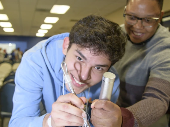 An anesthesiology specialist gives a demonstration on intubation.