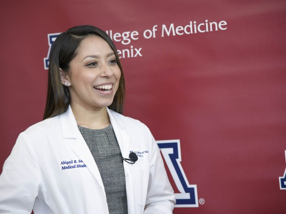  Primary Care Physician scholarship recipient Abigail Solorio smiles for a photo before the reception. 
