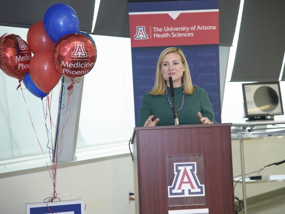 Phoenix Mayor Kate Gallego speaks to the audience at the University Arizona College of Medicine - Phoenix Associate Dean of Admissions and Recruitment Glen Fogerty, PhD, MBA, speaks to attendees during the Primary Care Physician scholarship reception. 