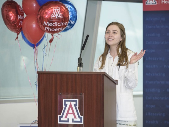 Primary Care Physician scholarship recipient Merrion Dawson speaks to attendees during the reception.