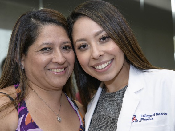 Primary Care Physician scholarship recipient Abigail Solorio poses for a photo with a family member. 