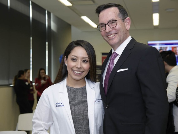 Primary Care Physician scholarship recipient Abigail Solorio poses for a photo with University of Arizona College of Medicine - Phoenix Associate Dean of Admissions and Recruitment Glen Fogerty, PhD, MBA.