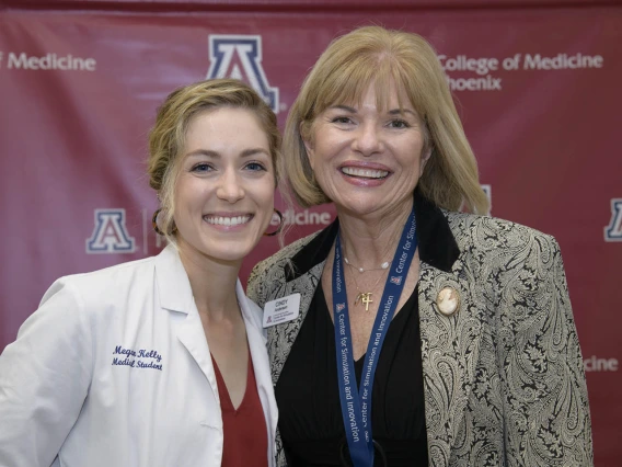 Primary Care Physician scholarship recipient Megan Kelly poses for a photo with Cindy Anderson, University of Arizona College of Medicine - Phoenix director of operators for the Center for Simulation and Innovation. 