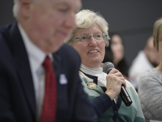 Lynda Ransdell, PhD, dean of Northern Arizona University’s College of Health and Human Services, asks a question during the town hall.