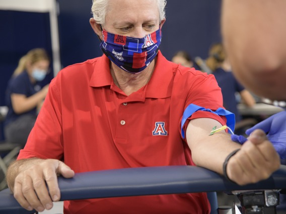 On April 30, the University of Arizona and the state of Arizona began an effort to test all frontline health care workers and first responders for antibodies to the virus that causes COVID-19. The first group included 4,500 first responders, health care workers, and some members of the general public from Pima County. UArizona President Robert C. Robbins undergoes a blood draw for his antibody test.
