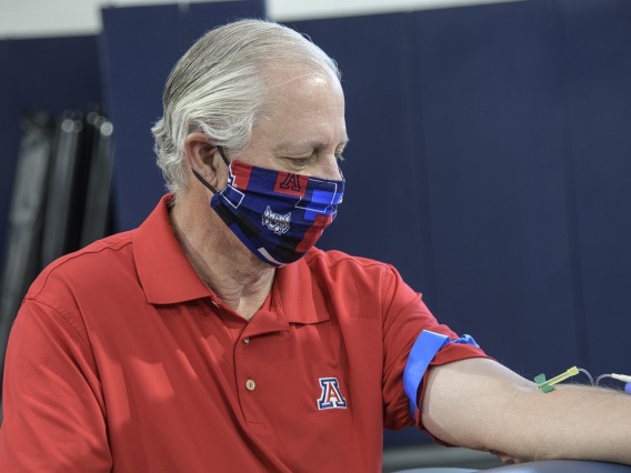 University of Arizona President Robert C. Robbins undergoes a blood draw for antibody testing.