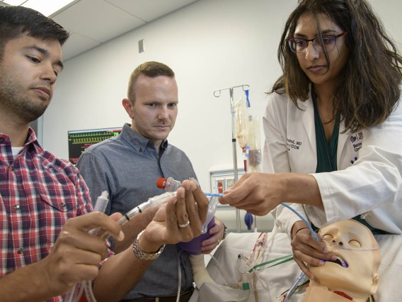 Pulmonary residents use ASTEC’s SimDeck to practice medical procedures in simulated environments.