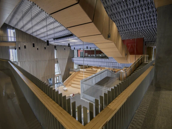 Looking down at The Forum from the second floor, no vertical columns obstruct the view. The staircase on the west side of the building allows easy access to upper floors, and is designed to discourage elevator use.