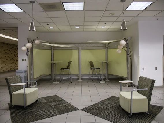 The lounge area in front of the Arizona Health Sciences Library has been slightly reconfigured to facilitate physical distancing between people.