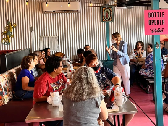 Joann Sweasy, PhD, director of the UArizona Cancer Center, speaks at a Scientific Café event at Rollies Mexican Patio restaurant.