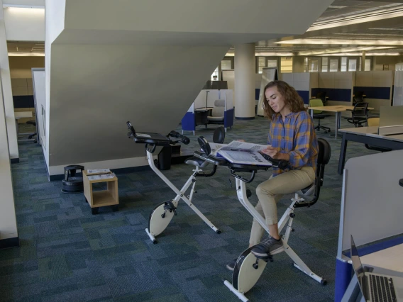 Fancy some exercise on a stationary bike while you study between classes? If you said yes, then head on over to the Health Sciences Library on the Tucson campus where a couple of exercise bikes are tucked under a staircase. The bikes have trays for books or laptops, so you can work while you ride. 