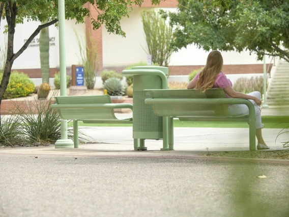 Sometimes a favorite place can be right in the middle of the action, like these shaded benches on the Tucson campus, flanked by a walking path on one side and a bike path on the other between Drachman Hall and the Medical Research Building. 