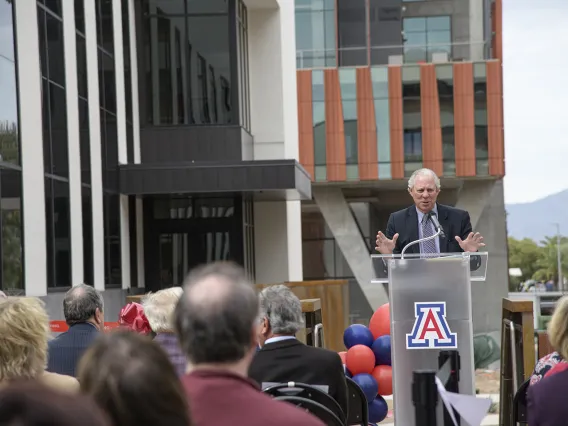 University of Arizona President Robert C. Robbins, MD, congratulates the College of Pharmacy on the Skaggs expansion and renovation project.