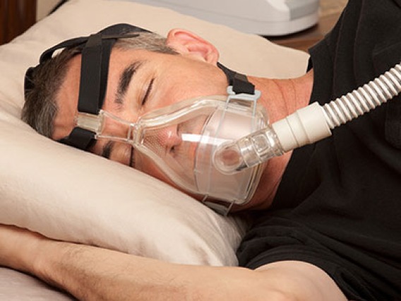 Person using a CPAP machine