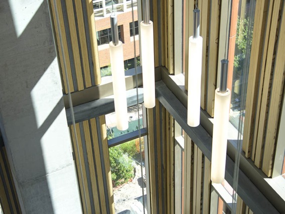 This lofty perch in the Health Sciences Innovation Building is a favorite for those who want to have a birds-eye view of the Tucson campus in a space with a towering ceiling and air conditioning. 