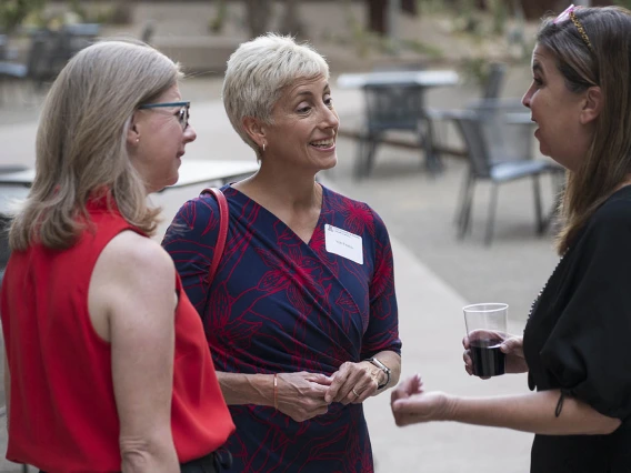 (From left) Anne Breckenridge Barrett, JD, MA, senior director for campaign and liaison to the executive office of the president for the University of Arizona Foundation; Vicki Fleisher, JD, senior vice president for development for the University of Arizona Foundation; and Carrie Whitten Simmons, senior manager for marketing, communications and engagement for the All of Us Research Program University of Arizona-Banner Health, visit after the first UArizona Health Sciences Tomorrow is Here Lecture Series in