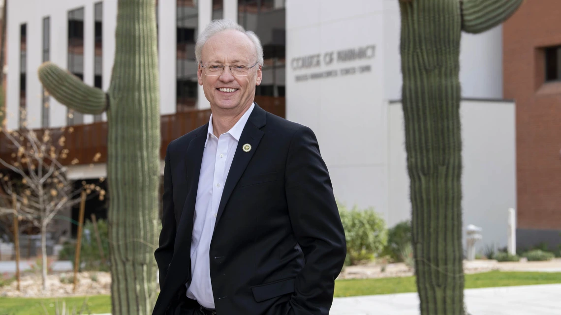 College of Pharmacy Dean Rick G. Schnellmann, PhD, stands in front of the renovated and expanded Skaggs Pharmaceutical Sciences Center. 