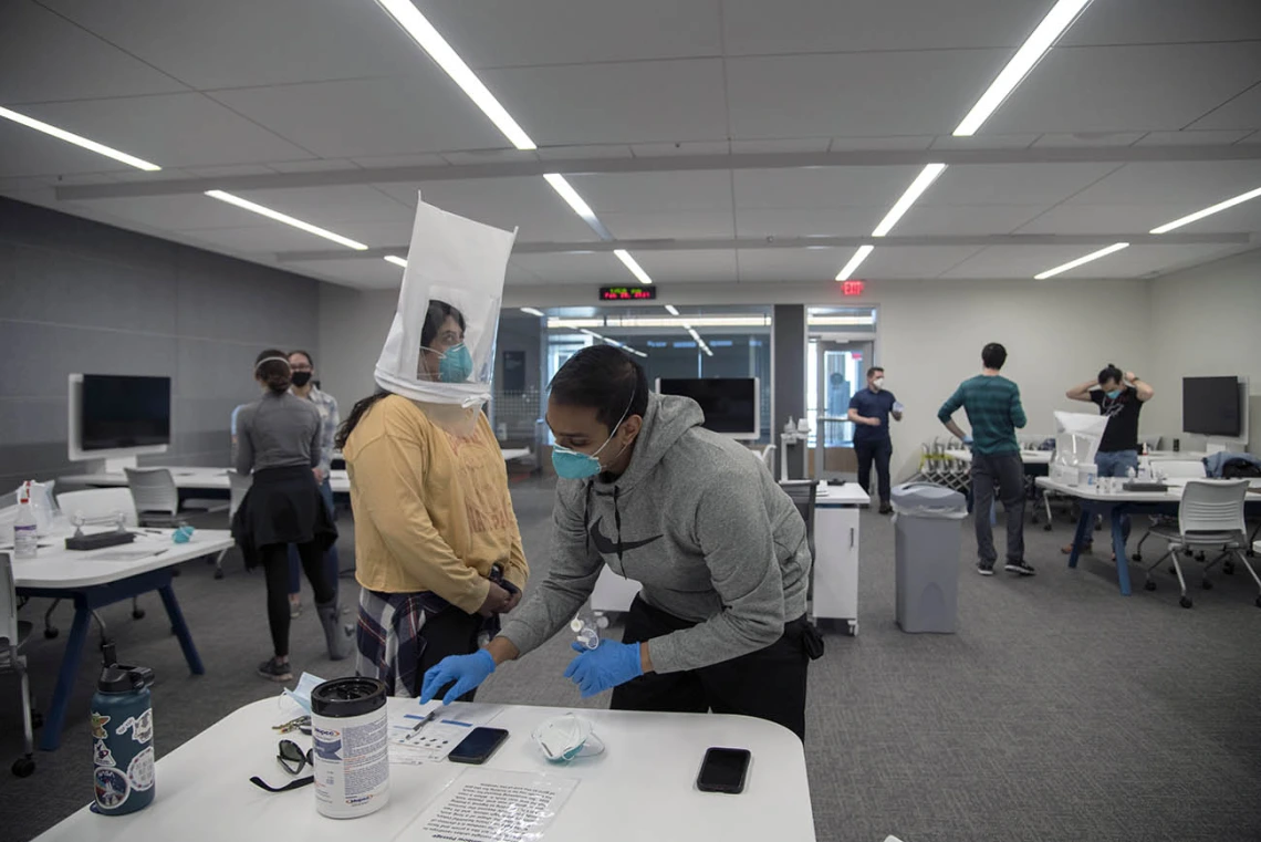 College of Medicine – Tucson students during different phases of their N95 mask fittings.