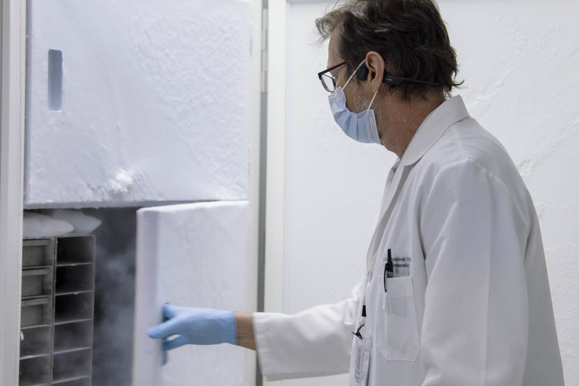 Michael Badowski, PhD, associate research scientist in the Division of the Translational and Regenerative Medicine at the College of Medicine – Tucson, is on the small team tasked with overseeing vaccine storage on campus, where vials of the Pfizer COVID-19 vaccine are stored in freezers.