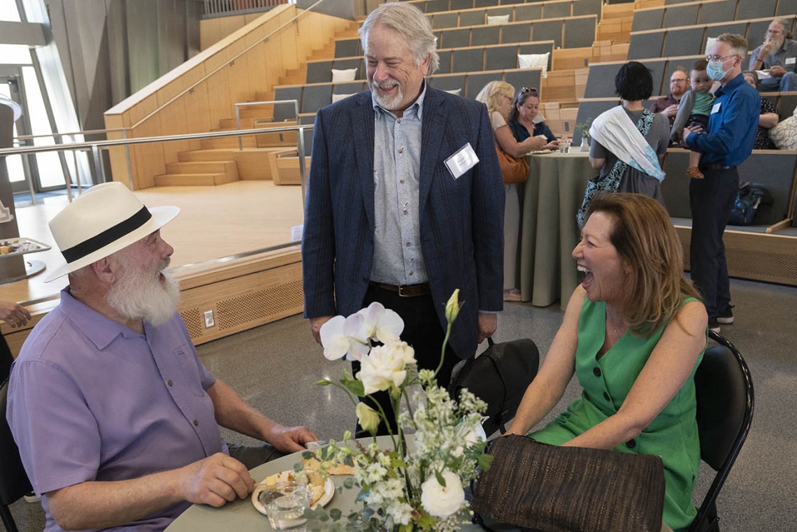 Andrew Weil, MD, Dan Derksen, MD, associate vice president for Health Equity, Outreach and Interprofessional Activities at UArizona Health Sciences, and Victoria Maizes, MD, visit during a reception after the groundbreaking for the Andrew Weil Center for Integrative Medicine.