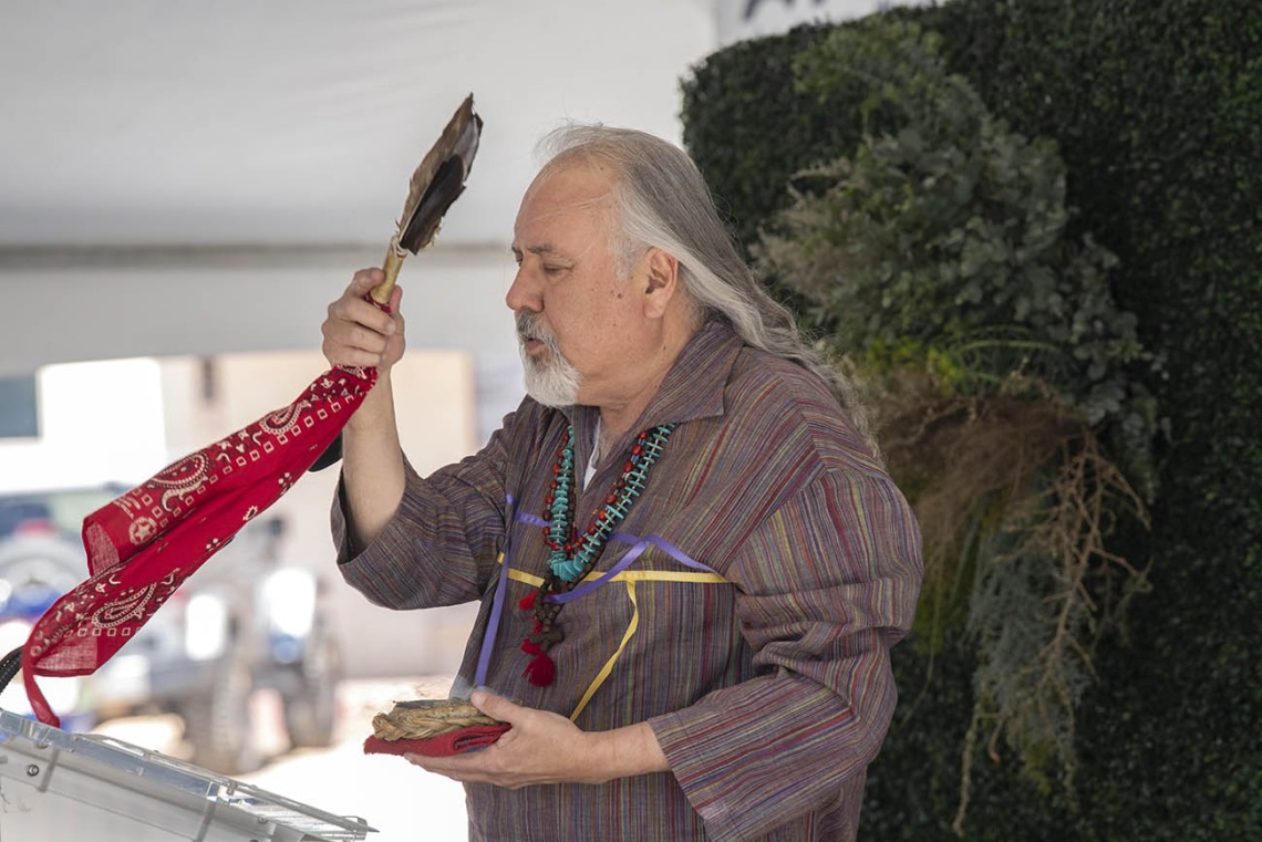 Carlos Gonzales, MD, assistant dean, curricular affairs at the UArizona College of Medicine – Tucson, leads a blessing ceremony using a prayer to the Seven Sacred Directions before the groundbreaking for the Andrew Weil Center for Integrative Medicine on the University of Arizona Health Sciences campus in Tucson.