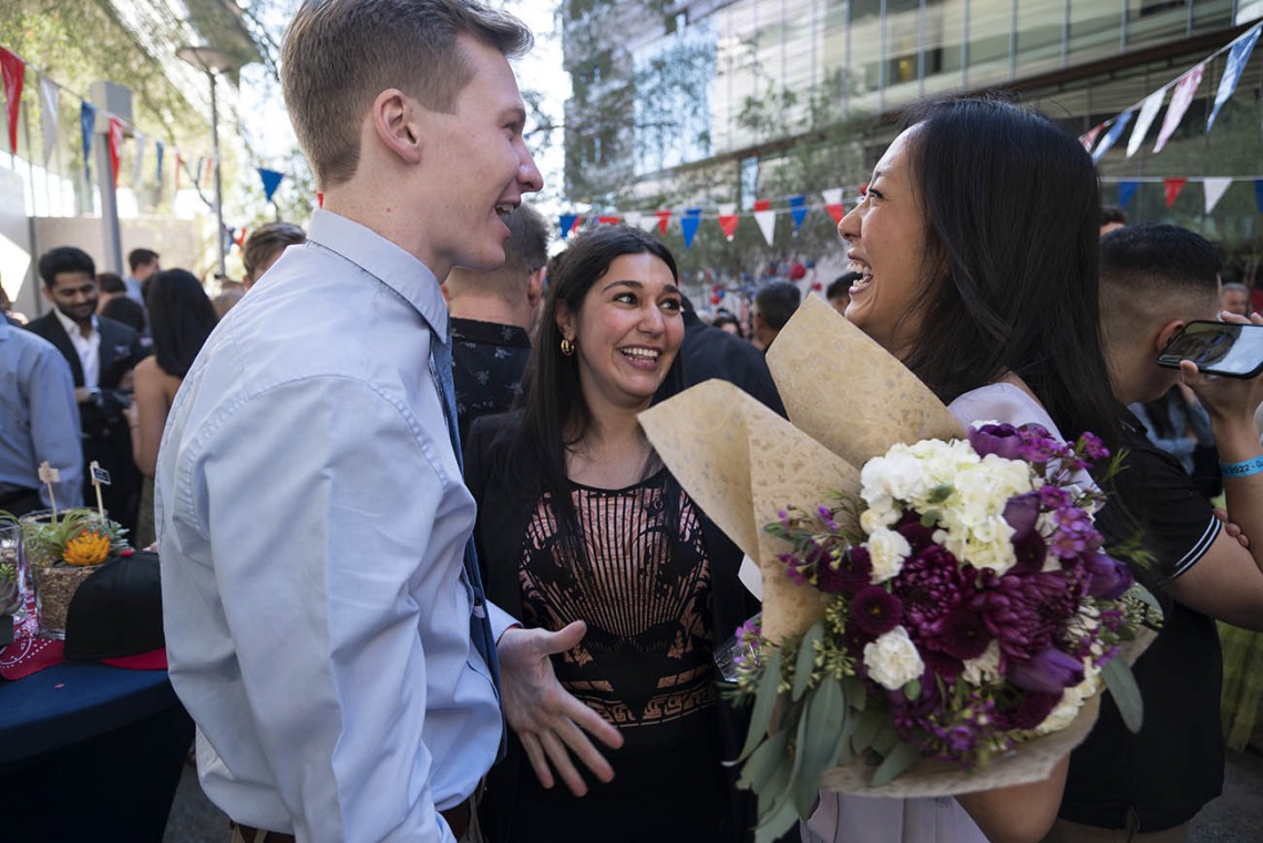 Classmates (from left) Alec Smith, Nour Bundogji and Keni Lin congratulate each other after their matches during the UArizona College of Medicine – Phoenix Match Day 2022 event.
