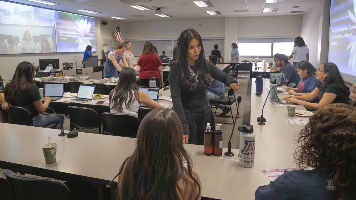 Timian Godfrey, DNP, APRN, FNP-BC, meets with students taking part in the annual summer Arizona Nursing Career Apex Transitions program and summer intensive at the University of Arizona College of Nursing. 