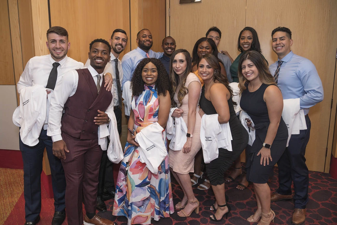 University of Arizona College of Medicine – Phoenix students pose for a photo before the start of the Class of 2026 white coat ceremony at Symphony Hall in downtown Phoenix.