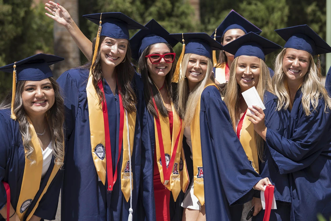 Some of the 49 College of Nursing 2022 summer graduates from the Bachelor of Science in Nursing Integrative Health Pathway program celebrate the completion of their degrees.